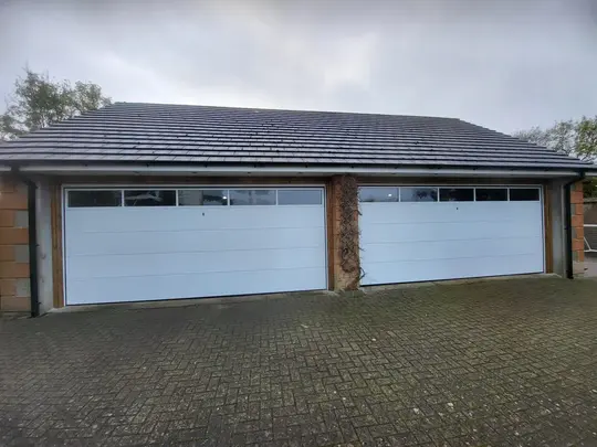 Double garage doors with windows in white, Lisburn