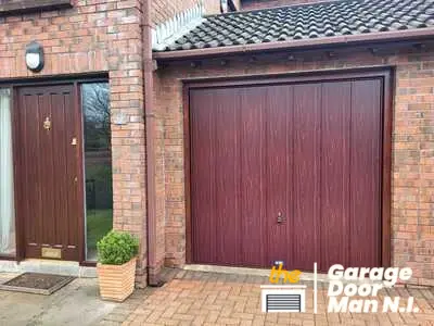 Rosewood colour Hormann up and over garage door in Malone, Belfast.