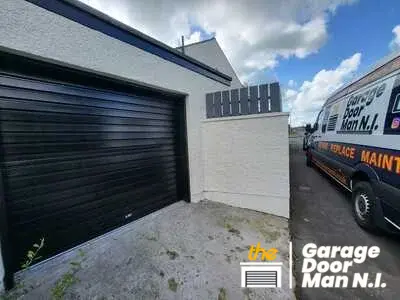 Black single-skinned roller garage door in Lisburn.